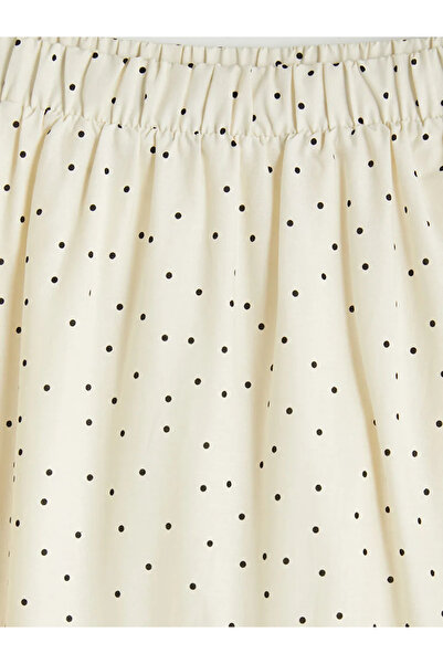 LC Waikiki Μαύρη πουά μίντι φούστα με διπλό στρίφωμα