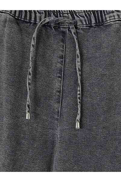 LC Waikiki Γυναικείο τζιν παντελόνι ανθρακί με ελαστική μέση και φαρδιά μπατζ...