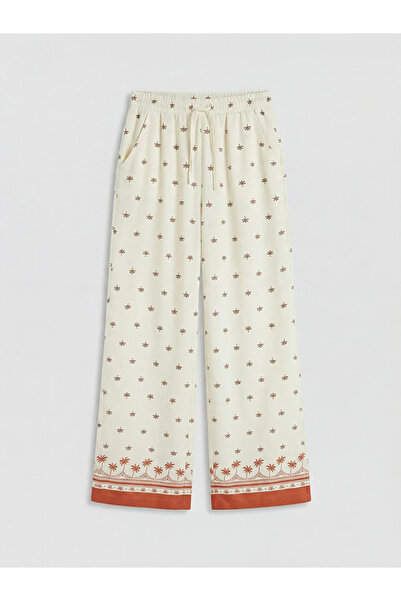 LC Waikiki Παντελόνι για κορίτσια με σχέδια σε χρώμα εκρού