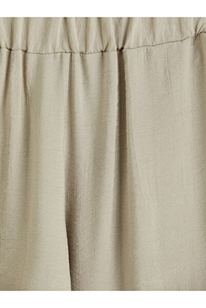 LC Waikiki Μπεζ γυναικείο παντελόνι από σατέν ύφασμα με ελαστική μέση