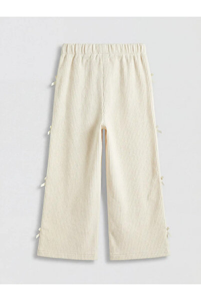 LC Waikiki Παντελόνι για κορίτσια με δαντέλα και φιόγκο σε χρώμα εκρού