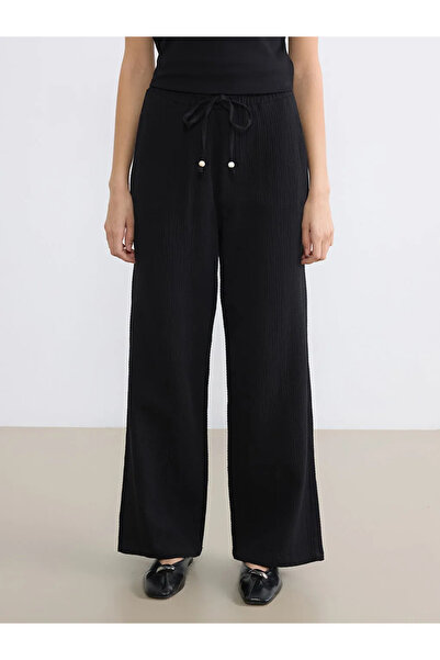 LC Waikiki Μαύρο γυναικείο παντελόνι μουσελίνας με ελαστική μέση και φαρδιά μ...