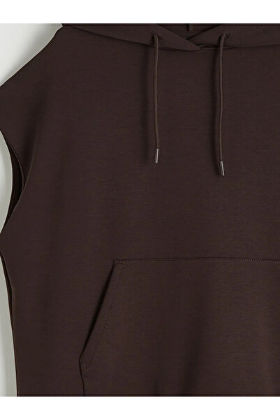 LC Waikiki Καφέ γυναικείο φούτερ με κουκούλα, με τσέπες καγκουρό, απαλής υφής...