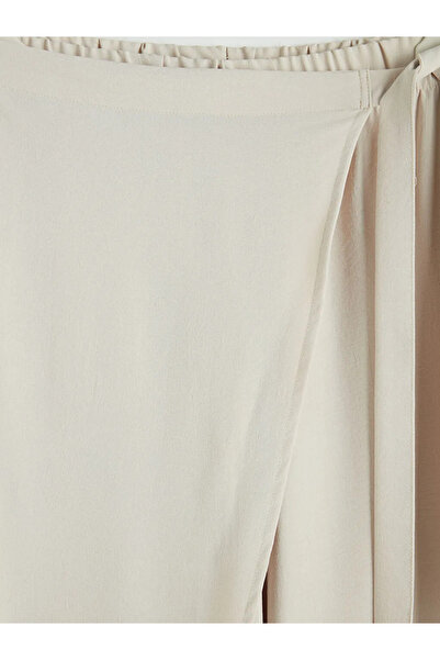 LC Waikiki Μπεζ γυναικείο παντελόνι με φαρδιά μπατζάκια και δέσιμο στη μέση