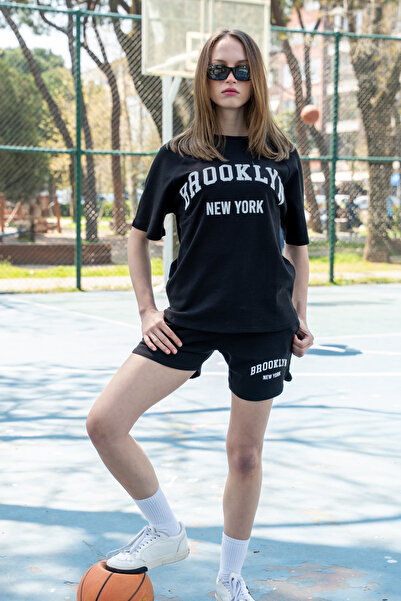 DI LORIA Γυναικείο σετ με μαύρο εμπριμέ υπερμεγέθη καλοκαιρινό άνετο μπλουζάκ...