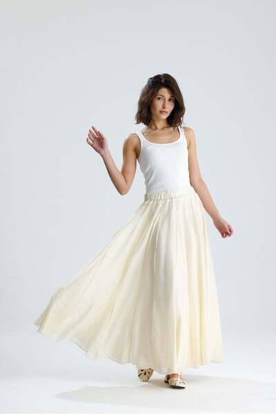 minaaise Κίτρινη φούστα από ύφασμα Tensel με μακριά επένδυση και λεπτομέρεια ...