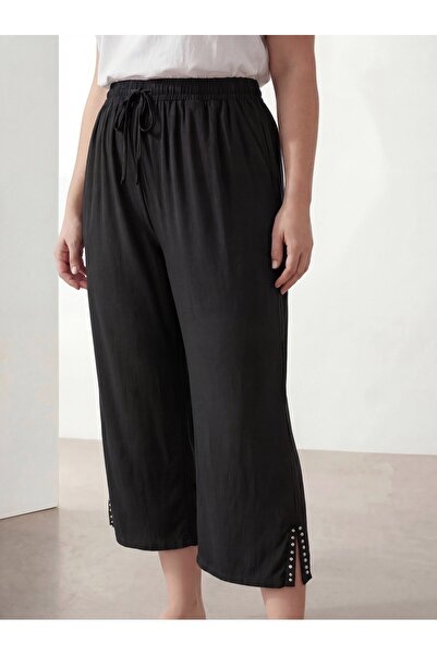 RMG Γυναικείο μαύρο κάπρι με σχισμή στο τελείωμα και στάμπα πέτρας, σε μεγάλο...