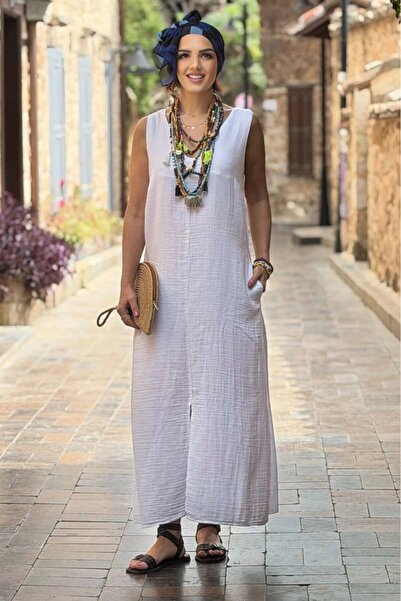 Nevin Kaya Moda Λευκό φόρεμα μουσελίνας με σκίσιμο μπροστά