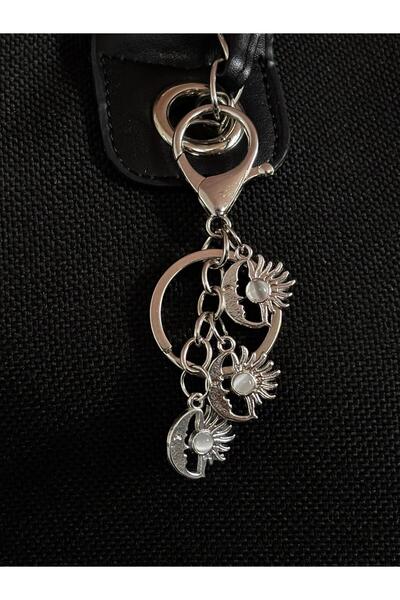bijoux uniques Γούρι τσάντας και μπρελόκ με φιγούρα Σελήνης και Ήλιου