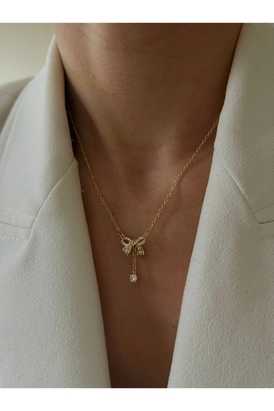 ANKA JEWELLRY ZİRKON TAŞLI FİYONK DETAYLI SALLANTILI ÇELİK GOLD KADIN KOLYE