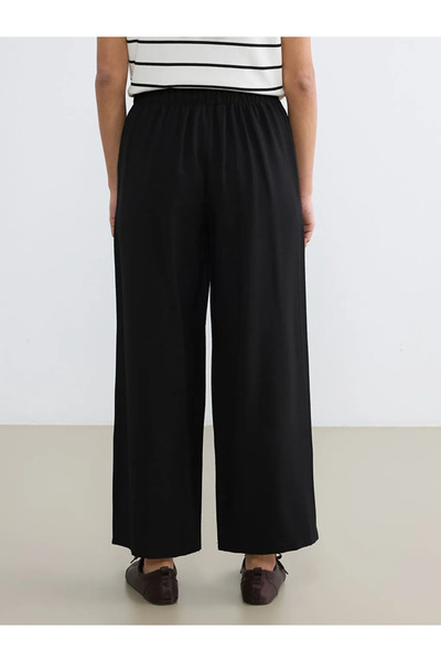 LC Waikiki Μαύρο γυναικείο παντελόνι με ελαστική μέση, χαλαρή εφαρμογή