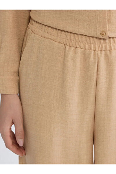 LC Waikiki Γυναικείο παντελόνι με ελαστική μέση σε μπεζ χρώμα