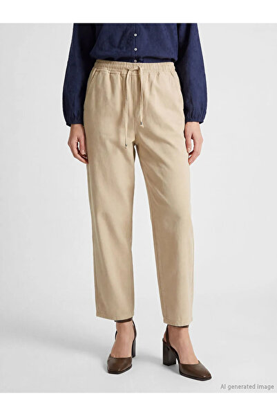 LC Waikiki Μπεζ γυναικείο τζιν παντελόνι με ελαστική μέση και σε γραμμή μπαλόνι