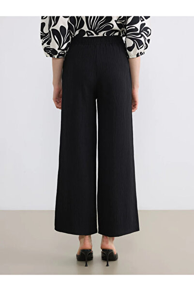LC Waikiki Μαύρο γυναικείο παντελόνι με ελαστική μέση φαρδιά πόδι