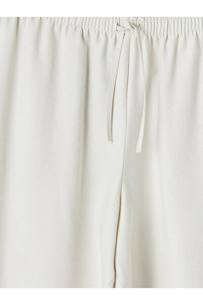 LC Waikiki Μπεζ γυναικείο παντελόνι με ελαστική μέση και μείγμα Modal