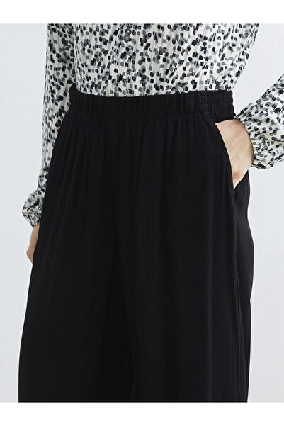 LC Waikiki Μαύρο γυναικείο παντελόνι με ελαστική μέση φαρδιά πόδι