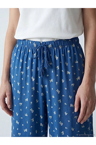 LC Waikiki Γυναικείο παντελόνι πιτζάμας σε μπλε ναυτικό χρώμα με ελαστική μέσ...