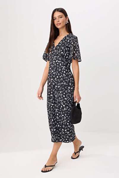 Συλλογή Trendyol Μαύρο-λευκό φλοράλ κοντομάνικο μάξι υφαντό φόρεμα TWOSS26EL0...