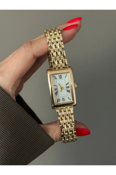 h&b design jewel ساعة ذهبية بأرقام رومانية