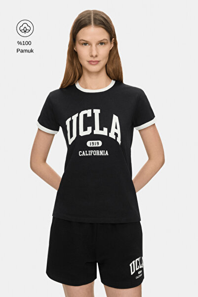 UCLA SAVANNAH Μαύρο γυναικείο μπλουζάκι με στάμπα 100% βαμβάκι και κανονική ε...