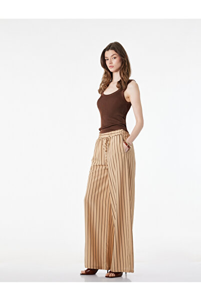 Koton Ελαστική μέση, δεμένο ύφασμα βισκόζης, λεπτομέρεια τσέπης, φαρδύ παντελ...