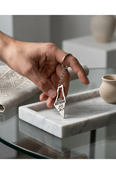 Zaytoon Χάρτης της Παλαιστίνης με το Kübbatu alsahra και την αραβική παροιμία...