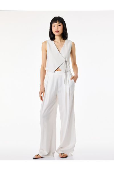 Koton Ασύμμετρο διπλό γιλέκο από ύφασμα βισκόζης με λεπτή εφαρμογή και λεπτομ...