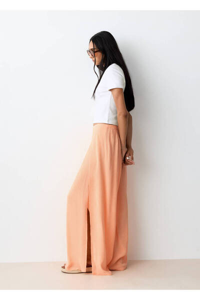 Mango Teen Yandan yırtmaçlı dökümlü pantolon