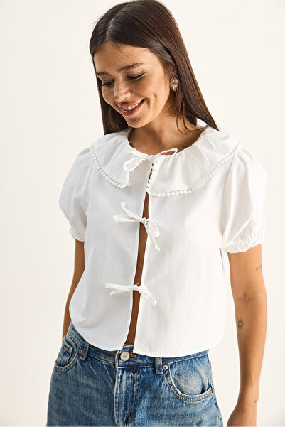 Bianco Lucci Γυναικεία μπλούζα με λεπτομέρεια δεσίματος στο γιακά και μανίκια...