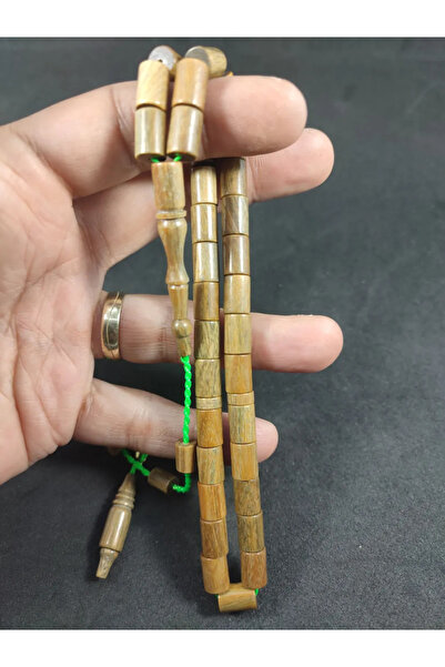 İskeçe Tesbih İsmail Erol's Masterpiece: a Fragrant Rosewood Piece Like an Arrow