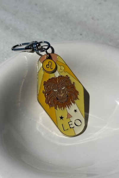 klovi Breloc și accesoriu pentru geantă cu design importat Leu.
