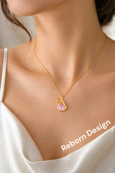 REBORN DESIGN سلسلة فولاذية 316L ذهبية اللون على شكل طائر البجعة الوردي