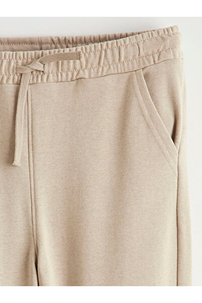 LC Waikiki Μπεζ ανδρικό παντελόνι Jogger με ελαστική μέση