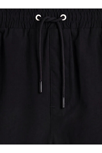 LC Waikiki Μαύρο κοντό ανδρικό σορτς κολύμβησης με ρίγες στα πλαϊνά