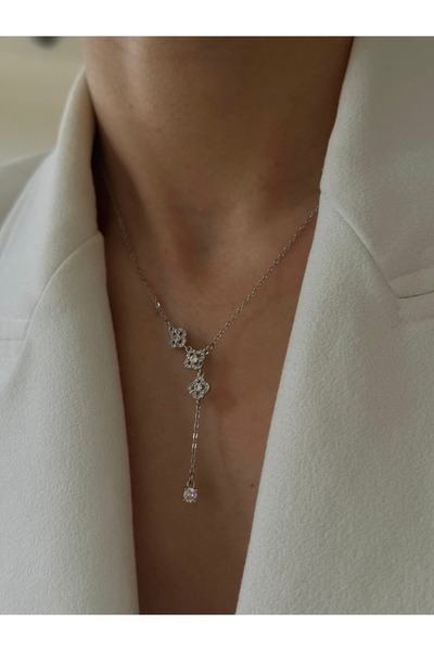 ANKA JEWELLRY قلادة نسائية من الفولاذ بتصميم زهرة متدلية مرصعة بحجر الزركون