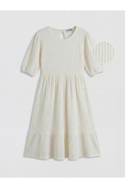 LC Waikiki Λευκό φόρεμα για κορίτσια με υφή και λαιμόκοψη ποδηλάτου