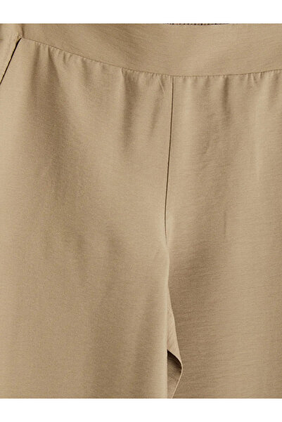 LC Waikiki Γυναικείο παντελόνι με ελαστική μέση σε μπεζ χρώμα