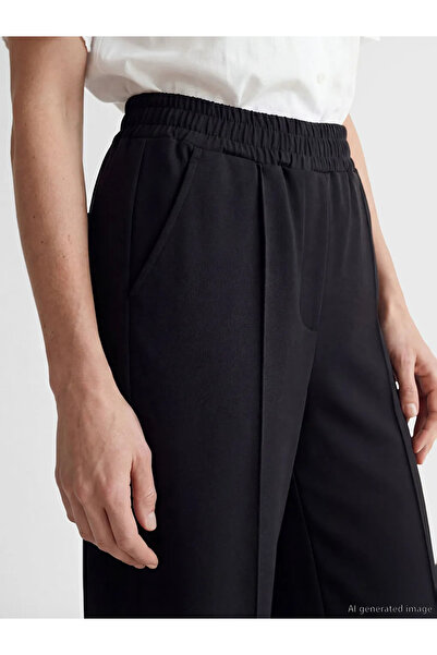 LC Waikiki Μαύρο γυναικείο παντελόνι με ελαστική μέση φαρδιά πόδι