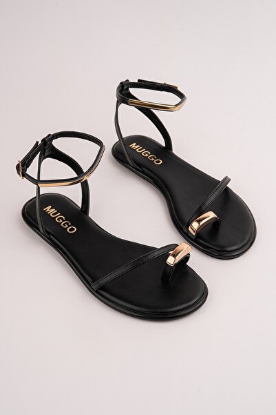 MUGGO Γυναικεία ίσια σανδάλια MALDİV με χρυσή μεταλλική λεπτομέρεια και λουρά...