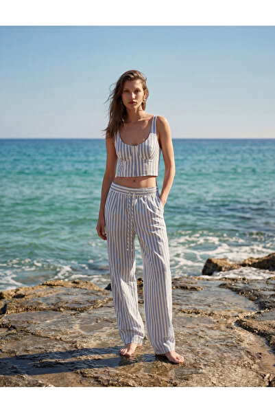 Koton Παντελόνι με φαρδιά μπατζάκια, ριγέ, με λεπτομέρειες από πλισέ και τσέπ...