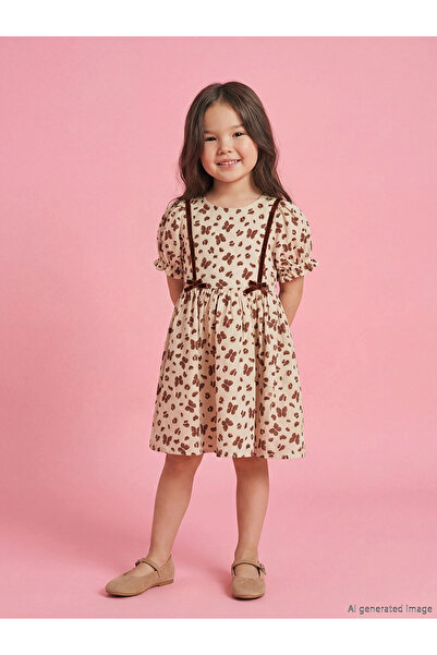 LC Waikiki Παιδικό φόρεμα LCW σε μπεζ χρώμα με λαιμόκοψη πεταλούδα και στάμπα...
