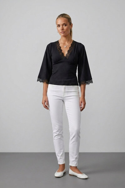 Şiir Γυναικεία μπλούζα & τοπ & μπλουζάκι QUIT Slim Fit με λεπτομέρεια από δαν...