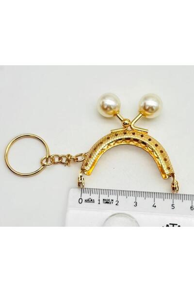 angel çanta aksesuar Κλιπ πορτοφολιού 5 εκ. με μπρελόκ σε ανοιχτό χρυσό χρώμα...