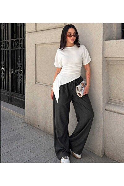 Budan Export Γυναικείο κοντομάνικο μπλουζάκι με ασύμμετρη κοπή και λεπτομέρει...