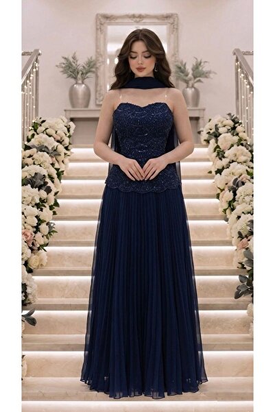 ittlalat alqamar Rana's dress