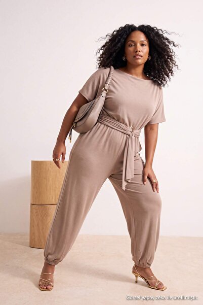 Trendyol Curve Beige Boat Neck Belt Detailed Plus Size Woven Jumpsuit Tbbss26...