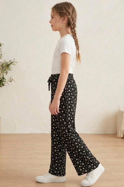 çatı moda Girl's Black Floral Patterned Wide-Leg Pants with Elastic Waist and Comfortable Cut