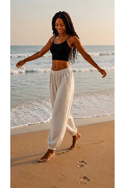 Butik KADIN NATUREL BELİ VE PAÇASI LASTİKLİ İNCE DOKULU KETEN PANTOLON