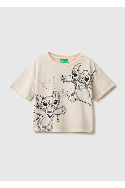 United Colors of Benetton تي شيرت أبيض بأكمام قصيرة مطبوع عليه Lilo&Stitch لل...