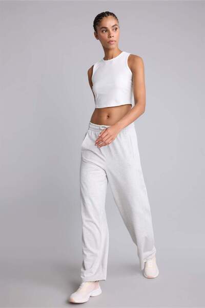 DeFacto Pantaloni sport din material textil, cu buzunare, croială standard, l...